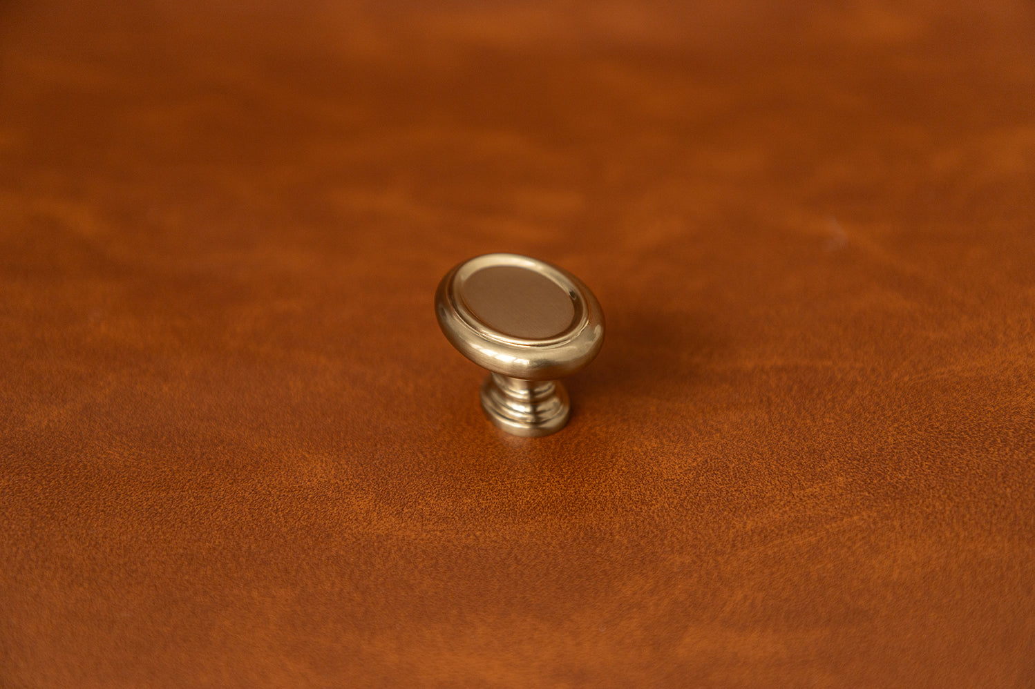 Belwith Keeler 1-1/2 Inch x 1-1/8 Inch Oval Berkshire Oval Knob - Champagne Bronze