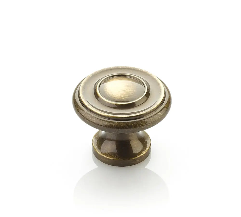 Schaub Traditional, Stepped Round Knob, Antique Brass, 1-1/4" dia Schaub Hentell Schaub