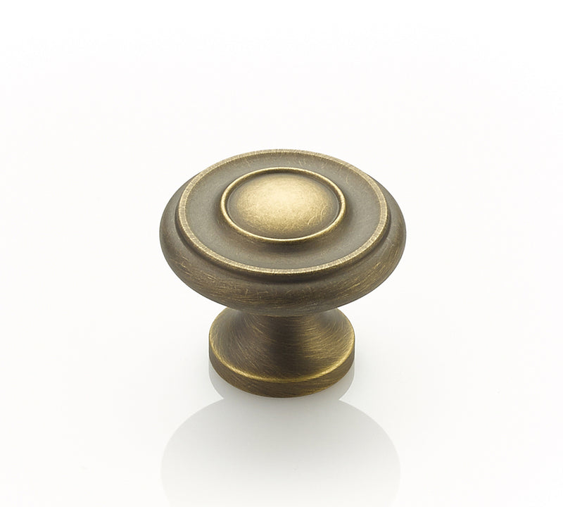 Schaub Traditional, Stepped Round Knob, Antique Light Brass, 1-1/4" dia