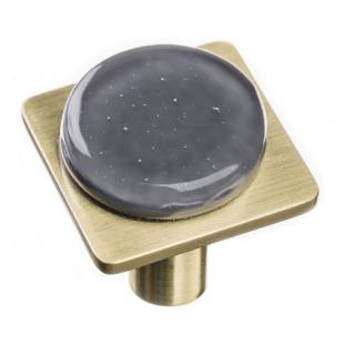 Geometric round slate gray on square satin brass knob